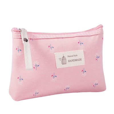 Bolso cosmético portátil personalizable para mujeres Tipo de patrón sólido y material de lona
