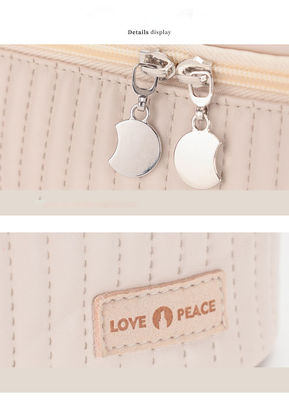 Bolso de ropa cosmético de PU impermeable para mujeres con cierre de cremallera y diseño portátil