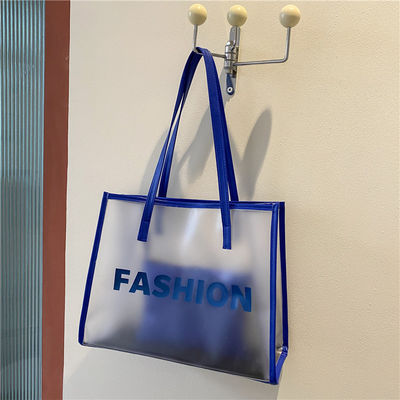 Logotipo personalizado Logotipo de moda Bolsa de compras de PVC para embalajes transparentes de productos
