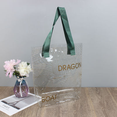 Bolso de playa de lujo de plástico transparente de PVC para mujeres más reciente estilo de moda OEM / ODM