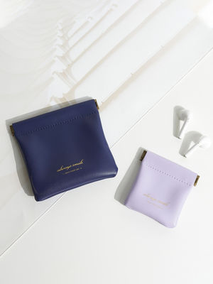 Impresión de logotipo personalizado Bolsa de almacenamiento de cuero de PU pequeña con patrón de letras y logotipo personalizado