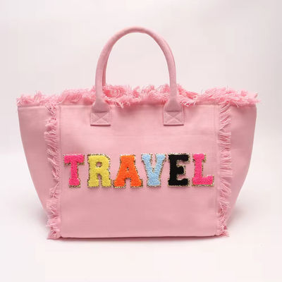 Lo más moderno es el Keymay Tassel Fringe, una bolsa grande de lona con dos mangos y correas.