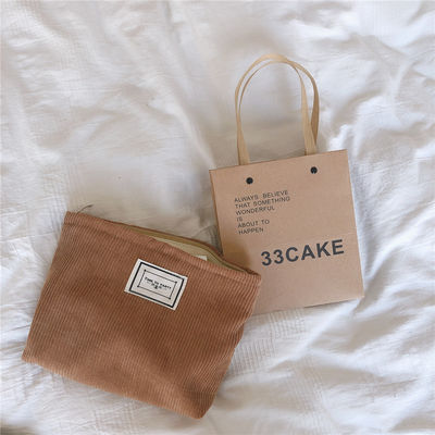 El más moderno maquillaje de corduroy con cremallera bolsa de ropa de baño bolso de baño nuevo diseño 2021