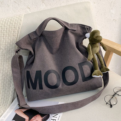 El más nuevo estilo de moda es una bolsa de lona con cremallera de gran capacidad y cierre de cremallera