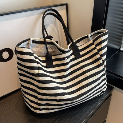 Mantente a la moda y organizado con este bolso de compra de lienzo de logotipo personalizado para mujeres
