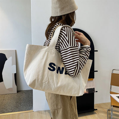 Bolso de algodón con bolsillo y cremallera