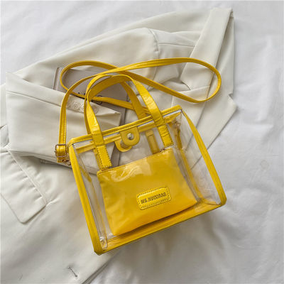 Revestimiento de nylon aceptable OEM/ODM Bolsas de compras de PVC transparentes con mango de color