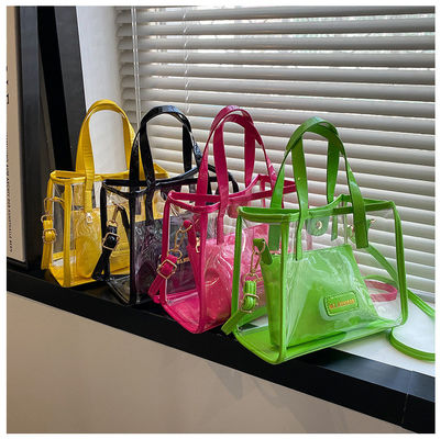 Revestimiento de nylon aceptable OEM/ODM Bolsas de compras de PVC transparentes con mango de color