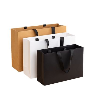 Bolsas de papel impresas personalizadas de cartón Bolsa de regalo de lujo de papel Kraft blanco para bolsas de compras