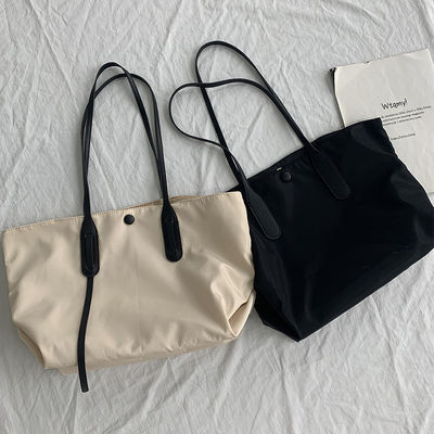 Bolsa de mensajero con cremallera Material de nylon Impresión de logotipo Bolsa de compras para la vida diaria