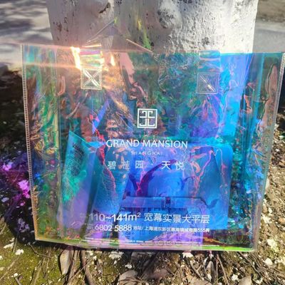 Bolso de compras transparente con gelatina láser irisante de PVC con logotipo impreso