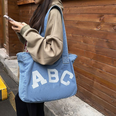 Bolsa de playa tejida de denim con estilo de bucle suave y aceptación OEM / ODM