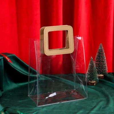Bolsa de toque transparente de PVC con mango de cuero para embalaje de regalo con logotipo personalizado