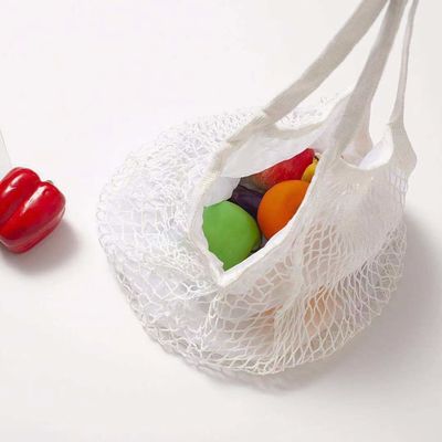 Logotipo personalizado Eco Organic Cotton Mesh Net Bolsa de compras reutilizable para alimentos de frutas y verduras