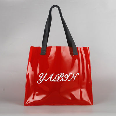 Impresión de pantalla de seda Bolsa de compras de logotipo personalizado Bolsa de PVC transparente con material de lona