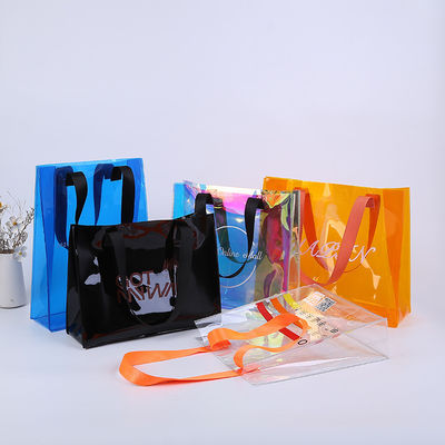 Impresión de pantalla de seda Bolsa de compras de logotipo personalizado Bolsa de PVC transparente con material de lona