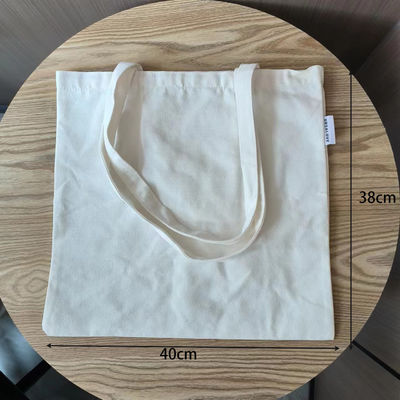 Bolsa de toque de lienzo personalizada aceptable OEM / ODM Color sólido Tipo de patrón de letra personalizable