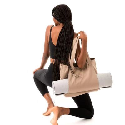 Bolso de esterilla de yoga de lona de algodón ecológico de color personalizado para yoguis conscientes del medio ambiente
