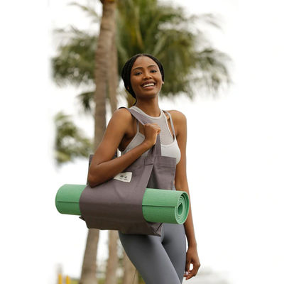 Bolso de esterilla de yoga de lona de algodón ecológico de color personalizado para yoguis conscientes del medio ambiente