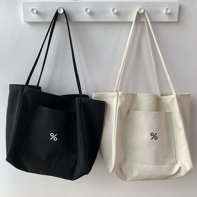 Bolso de ropa de lona ecológica de color personalizado para mujeres Gran capacidad y aceptable OEM / ODM