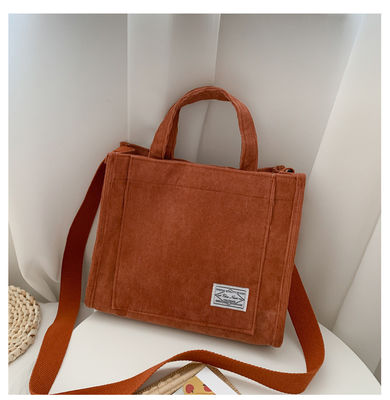 Bolso de ropa de corduroy con correa ajustable con logotipo personalizado