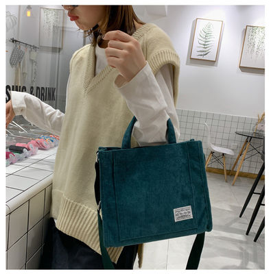 Bolso de ropa de corduroy con correa ajustable con logotipo personalizado