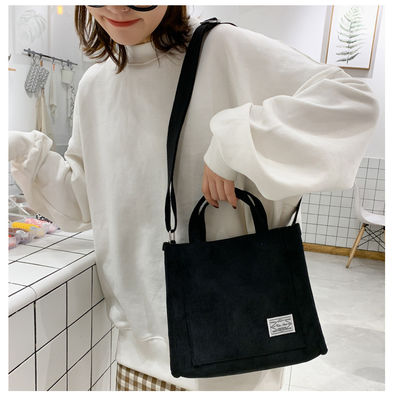 Bolso de ropa de corduroy con correa ajustable con logotipo personalizado