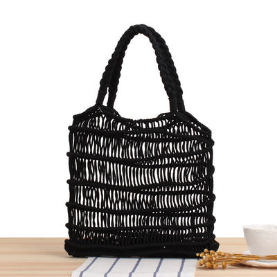 Color personalizado Verano 2022 Mujeres hechas a mano Bolso de paja hueco Bolso de mano de playa tejido