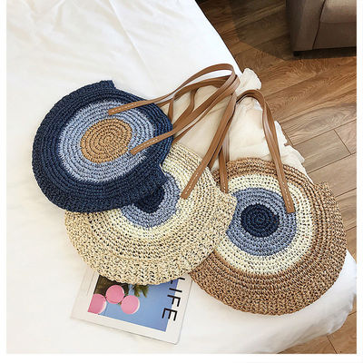 2022 Bolso de hombro de playa redondo tejido a mano Bolso de paja con mango de cuero y logotipo personalizado
