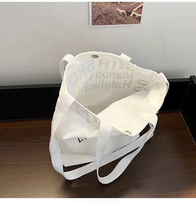 Las mujeres más modernas de lienzo bolso crossbody con mango de toque y patrón de letra