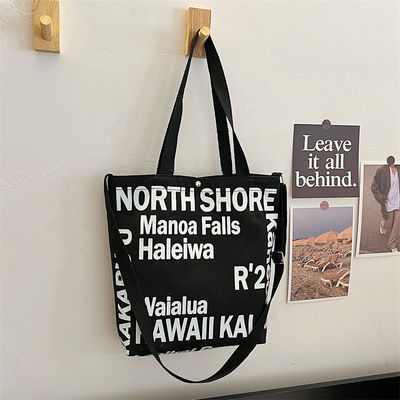 Las mujeres más modernas de lienzo bolso crossbody con mango de toque y patrón de letra