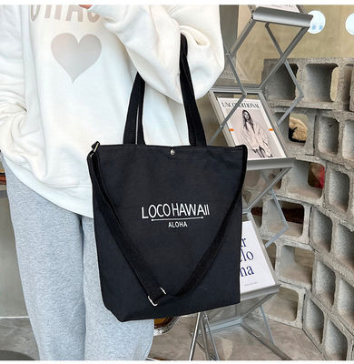Las mujeres más modernas de lienzo bolso crossbody con mango de toque y patrón de letra