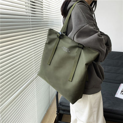Tienda de colores personalizada algodón orgánico lienzo bolsa de toque más reciente estilo de moda
