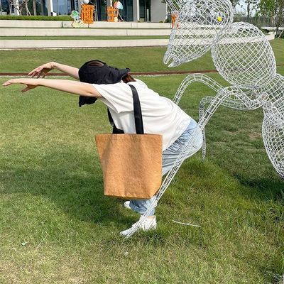 Bolsa de compras de papel Dupont en color personalizado con material impermeable y lavable