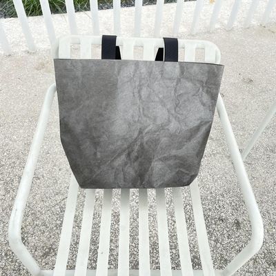 Bolsa de compras de papel Dupont en color personalizado con material impermeable y lavable