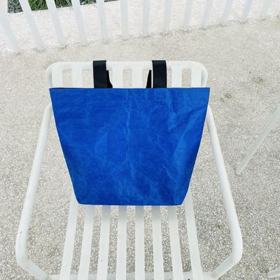 Bolsa de compras de papel Dupont en color personalizado con material impermeable y lavable