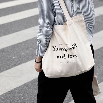 Bolsas personalizadas de color de algodón con estilo manipulado y logotipo de la empresa impreso