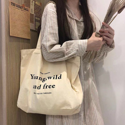 Bolsas personalizadas de color de algodón con estilo manipulado y logotipo de la empresa impreso