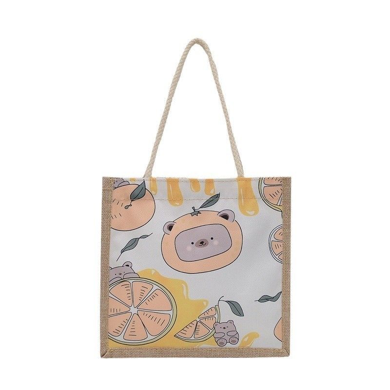 2024 Coreano Ins Simple Estudiante dibujos animados de lienzo bolsos de mano de las damas Mini bolsos para niñas