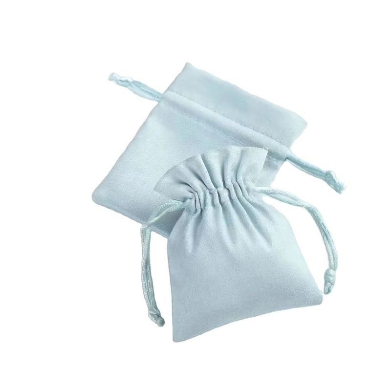 Acceptable OEM/ODM Bolso de cordón de terciopelo azul claro personalizado para la organización de joyería