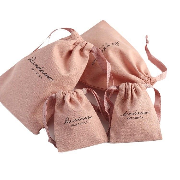 Mediano Embalaje de compras Bolsas de lienzo de algodón de color rosa suave impreso con cuerdas