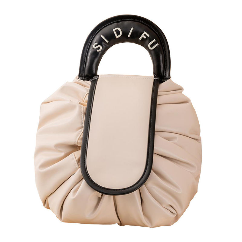 Diseño de logotipo personalizado Bolsa de maquillaje de PVC Tipo de patrón sólido de cuerda de tira Bolsa de viaje de artículos de tocador