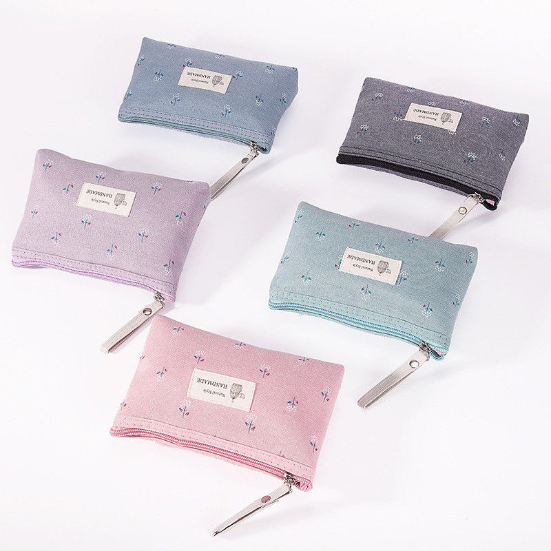 Bolso cosmético portátil personalizable para mujeres Tipo de patrón sólido y material de lona