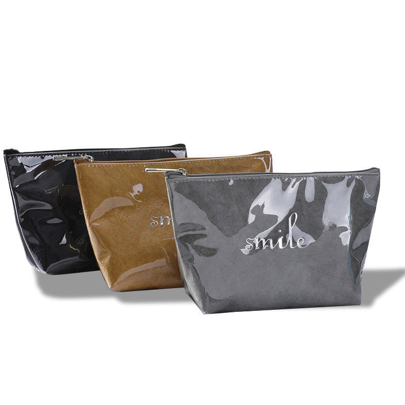Impresión de logotipo personalizado Bolsa de almacenamiento con cremallera Bolsa de tocador comercial Dupont de lujo para el día a día