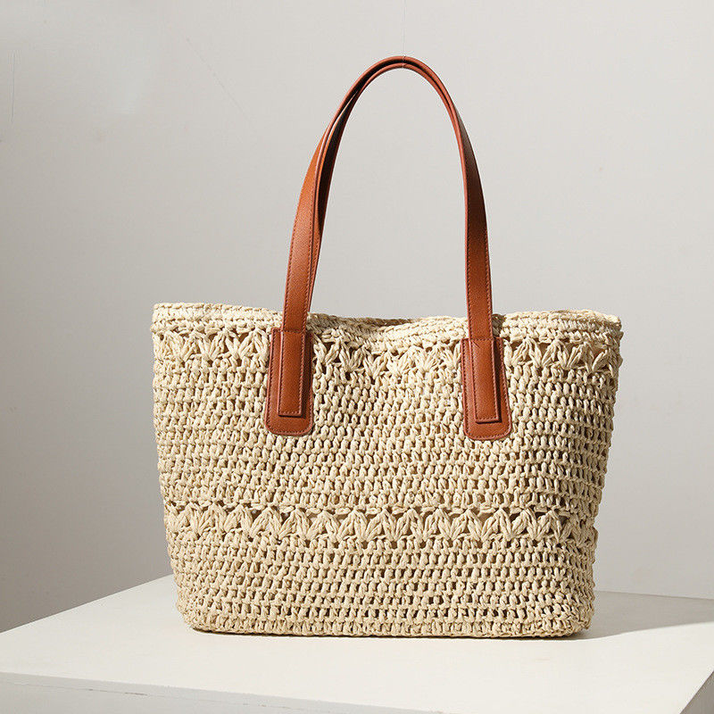 Número de mangos / correas Dos bolsas de paja de estilo 2023 bolsas tejidas para viajes a la playa salvaje