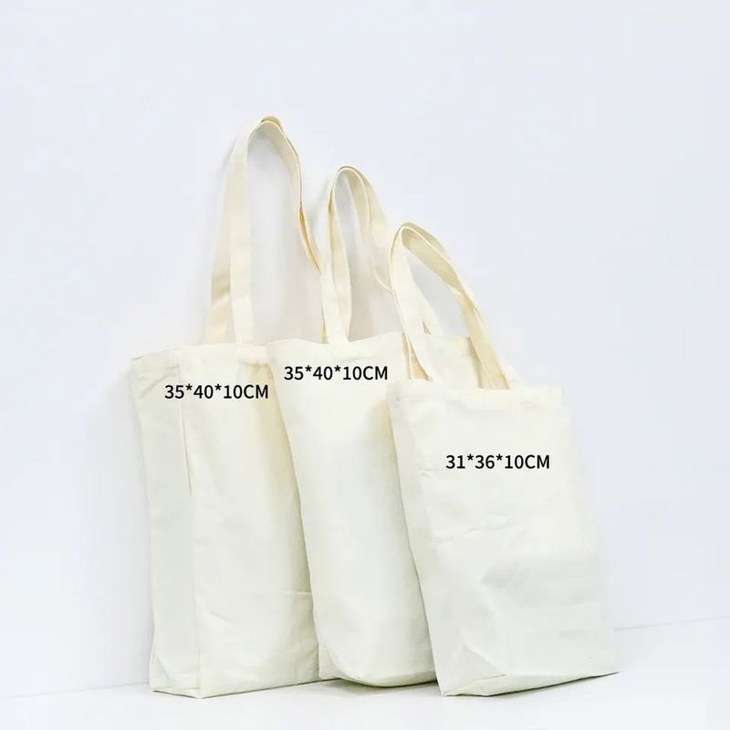 Bolsa de toque de lienzo personalizada aceptable OEM / ODM Color sólido Tipo de patrón de letra personalizable