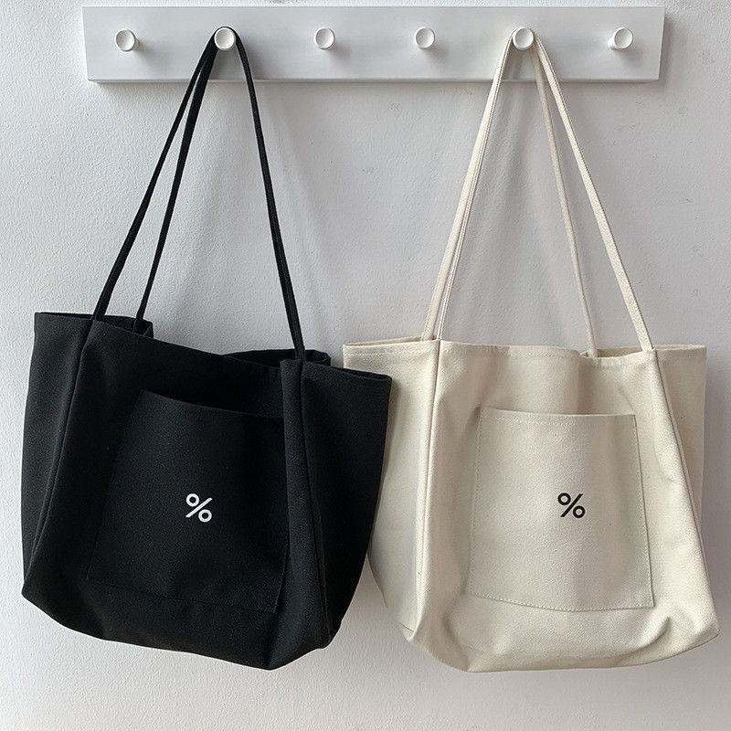 Bolso de ropa de lona ecológica de color personalizado para mujeres Gran capacidad y aceptable OEM / ODM